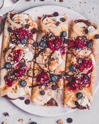 Bahare On Instagram Banana Nutella Crepes Topped With Whipped Cream More Bananas Crushed Hazelnuts And Chocolate Banana Nutella Crepes Food Nutella Crepes