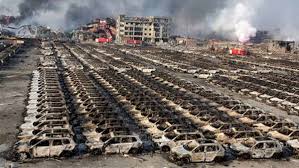 An injured woman was lying sprawled on the sidewalk. Photos Video Deadly China Blast Disrupts World S 10th Largest Port Abc7 New York