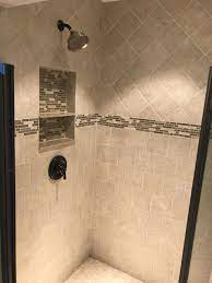4x4 Shower Using 6x6 Tiles Installed Upper On A Diagonal And Lower Subway With Accent Border And Box Marble Tiles Shower Tile Tile Installation Marble Tiles