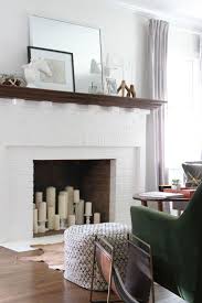 It can elevate a home and reflect the home owner. 15 Ideas Filling Empty Fireplace Pictures Home Candles In Fireplace Home Decor
