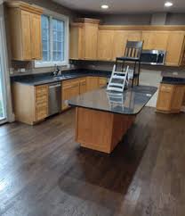 These maple cabinets have simple shapes, in a modern form made of light maple wood. Paint Color To Tone Down Maple Cabinets