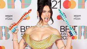 She celebrated winning the biggest gongs of the night by pleading superstar singer dua lipa thrilled fans by flashing her bum as she twerked on stage at the brit awards. R04 Hnyxhd0z M