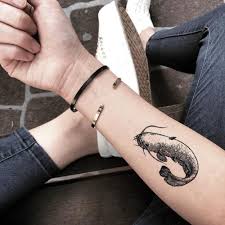 Catfish tattoos are quite unusual as they represent negativity and destruction. Catfish Temporary Tattoo Sticker Ohmytat