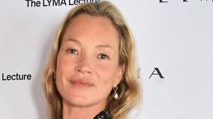 Kate Moss cuts an effortlessly chic figure in a blouse and jeans as she  joins elegant Sabrina Elba in leading the stars at a beauty lecture in  London