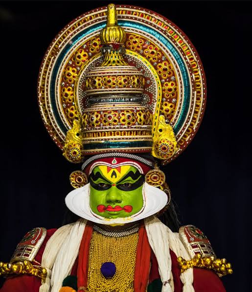 Elaborate Kathakali makeup and attire