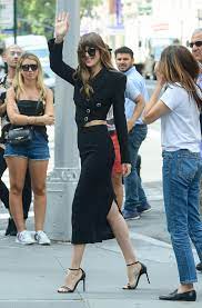 Your first fan source on dakota johnson's style and the clothes she wears. Dakota Johnson In White Prada Dress At Fifty Shades Freed Paris Premiere Dakota Johnson Fashion Photos
