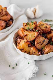 Butter Garlic Pancetta And Parmesan Roasted Potatoes Cravings Journal Recipe Parmesan Roasted Potatoes Spicy Recipes Potatoes
