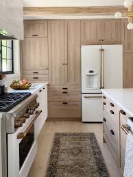 Cabinets that work (and look) smart. They Outfitted The Pantry Wall And Island With Light Wood Cabinet Fronts In Cove From Their Semihandmade X Chris L Kitchen Design Home Kitchens Kitchen Remodel