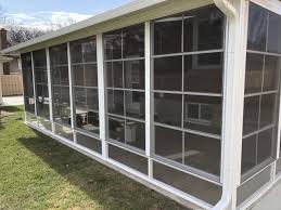 See www.comfortwindows.com for current promotions. 4 Track Vinyl Stacking Windows Screened Room Three Season Porch Craft Bilt