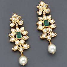 Gorgeous Kundan Jewellery With Green Stone Embellishments And South Sea Pearl Drop Find More At Www Jivaana Com Kundan Jewellery Jewelry Traditional Jewelry