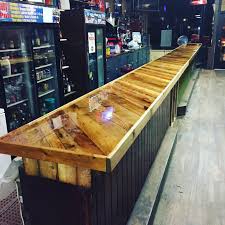 Bar Top Made From Pallet Boards And Covered With Epoxy Basement Bar Designs Pallet Bar Wood Bar Top