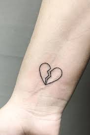 Broken heart with flowers tattoo. Awesome Broken Heart Tattoo Ideas Body Tattoo Art