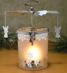 Spinning Candle Frosted Glass Spinning Candle Holder Angels And Snowflakes Silver Metal With Laser Cut Design Scandinavian Style Carousel Candle Scandinavian Home Decor Olivia Decor Decor For Your Home And Office