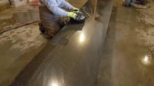 Use a trowel or paving tool to even out the top and push all of the concrete out to the sides as you work 3 Finishing Concrete Countertops How To Polish A Concrete Countertop