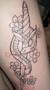 Outstanding white skull and open mouth snake with dagger tattoo design make on paper. Snake And Dagger The Tattoo By Supersibataru On Deviantart