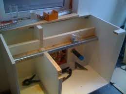 He basically just built a little table out of 2 by 4's. Farmhouse Sink Into Ikea Kitchen Cupboards Ikea Hackers