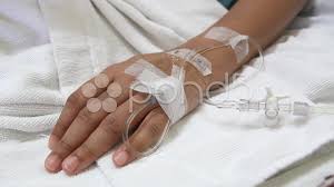 Closeup Saline Drip Into Patient Hand On Bed In Hospital Stock Video 27828324 Hd Stock Footage Saline Drip Hand Photo Hands