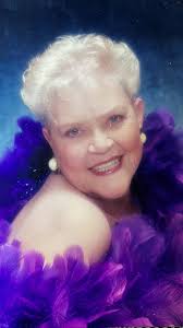 How can I restore this old photo of my wife from the late 80s and remove  the black spots from the white garment?