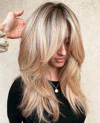 Layered hair with side bangs looks even more gorgeous with a dramatic side part. 50 Cute Long Layered Haircuts With Bangs 2021