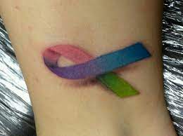 Latest colored ribbons cancer tattoos designs. Shade With The Color Colors That Mean The Most To You Awareness Ribbons Tattoo Ribbon Tattoos Awareness Tattoo