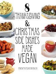 A green bowl piled high with mashed potatoes, garnished with a sprig of oregano. 8 Traditional Thanksgiving And Christmas Sides Made Vegan