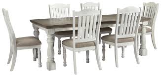 Living room furniture sets are complete with a sofa, ottoman, loveseat and recliner. Millennium Havalance 390381437 7 Piece Rectangular Dining Room Table And 6 Upholstered Side Chairs Set Sam Levitz Furniture Dining 7 Or More Piece Sets