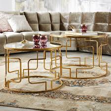 Runde Couchtische In Gold Mit Eleganten Verstrebungen Wohnzimmertische Couchtisch Rund Runder Wohnzimmertisch