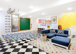 Black And White Checkered Floor Tiles Stylish Contemporary Basement Playroom Is Clad In Black And White Checkered Floor Tiles Complemented With A Candy D Basement Playroom Blue Sectional Home Decor
