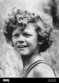 Johnny whitaker tom sawyer hi-res stock photography and images