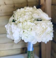 But when it comes to wedding flowers i personally feel that the latter of the two should be true. Ivory White Hydrangea Artificial Silk Bridal Bouquet Real Touch Silk Wedding Bouquets White Flower Bouquet Wedding Silk Wedding Bouquets Hydrangeas Wedding