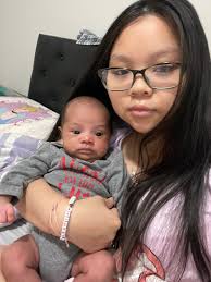 Can you edit my daughter into a family photo?