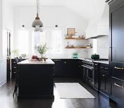 White kitchen cabinets with black hardware farmhouse wall. Designer Kitchen Renovation Home Bunch Interior Design Ideas