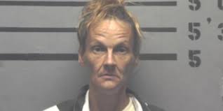 MPD: Woman charged with public intoxication after being arrested outside  gas station