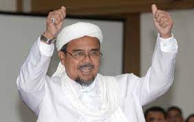 Habib rizieq shihab dilaporkan melakukan penistaan agama dalam ceramahnya di pondok kelapa. Rizieq Shihab Arab News