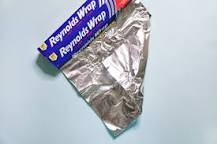 What side of aluminum foil do you cook on?