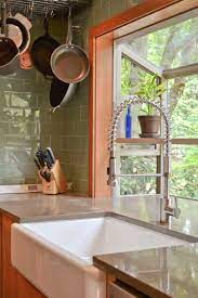 7 Timeless Kitchen Features That Will Never Go Out Of Style Kitchen Sink Window Timeless Kitchen Kitchen Garden Window