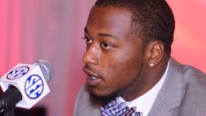 Ole Miss' Johnson says move back to LB has been an adjustment