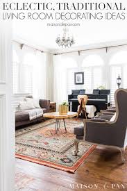 This living room is really working those gorgeous high ceilings, perfectly symmetrical columns, and large windows, which flood the space with sunlight. Eclectic Living Room With Colorful Neutral And Vintage Elements Maison De Pax