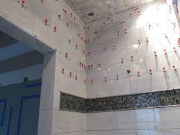 Set the first tile in the middle of the wall or floor, then continue outwards, using spacers between the tiles. Base Excellent Tile Leveling System Wall Floor Spacers Ebay Tile Leveling System Flooring Bathroom Floor Plans