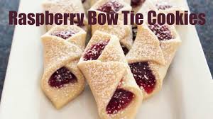 Little crumbly sugar cookies filled with a jammy raspberry filling are a sweet and pretty addition to holiday dessert spreads.todd coleman. Raspberry Bow Tie Cookies Youtube