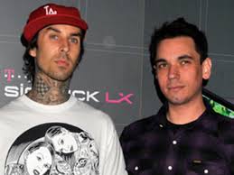 Within minutes of takeoff, the plane's two pilots tried to abort after a tire burst, but the aircraft bounced down the runway, went through a fence, and crashed into an embankment. Travis Barker Remembers Crash Dj Am