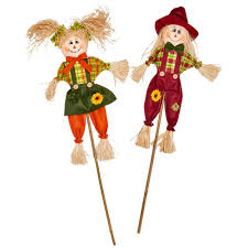 Even if it's a little late in the season to have a scarecrow protecting your garden, it's a perfect time to make a scarecrow for outdoor fall decorating. Set Of 2 Worth Imports 32 Scarecrow On Stick Home Kitchen Home Decor Accents Eudirect78 Eu