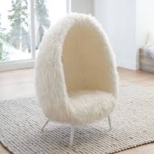 Create an inviting atmosphere with new living room chairs. Ivory Furlicious Faux Fur Cave Chair Lounge Chair Pottery Barn Teen