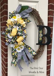 Black And White Wreath Images Black White Yellow Daisy Monogram Wreath The Pink Door Wreaths More On Facebook Summer Door Wreaths Holiday Door Wreaths How To Make Wreaths