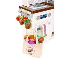 It features a refrigerator, oven, microwave, sink, and even a breakfast nook to eat their great meals once they are done cooking. Little Tikes First Market Kitchen With Over 20 Accessories R Exclusive Toys R Us Canada