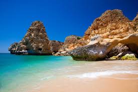 Situated in a sheltered cove and protected by stunning rock formations, it attracts tourists and locals alike. Lonely Planet On Twitter The Best Beaches In Portugal S Algarve Http T Co Vhzobbch7u Travel Lp Http T Co K3wyz5c3um