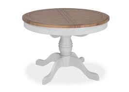 Our branch round dining table is a substantial dining table with a subtle branch design made from a metal inlay. Eden Grey Oak Extendable Round Dining Table Eddie Maguire Electrical Furniture