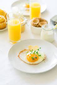 Make this simple fruit juice recipe with a citrus press and add a pinch of salt and sugar (optionally) to pair it up with any breakfast you choose. Traditional Breakfast With Fried Egg Yogurt Homemade Muffins Citrus Curd And Orange Juice On White Background Selective Focus High Key Stock Photo Ef3b01ad 9ebf 409a A0f4 D477fb89abbf