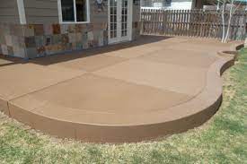 She's asked me what can be done to make the color uniform. Sandstone Colored Concrete Patio Modern Design Colored Concrete Patio Concrete Patio Designs Concrete Patio