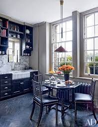When i first saw the kitchen of layla from the lettered cottage years ago i wanted to try black kitchen cabinets in my own home. These Painted Kitchens Will Have You Craving Color Home Black Kitchens Painting Kitchen Cabinets